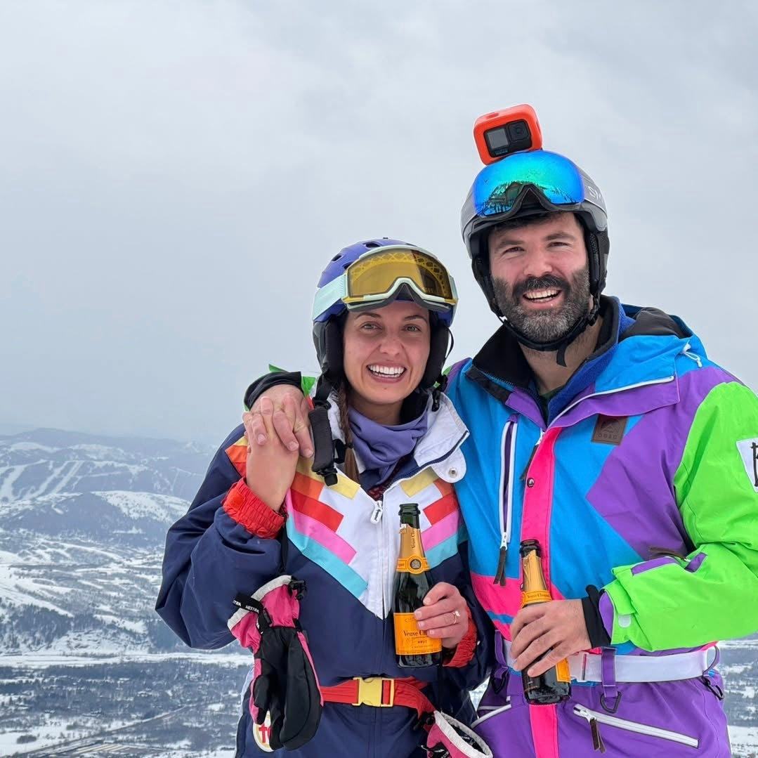 Couple celebrating engagement with a custom engagement ring from Design by Sevan