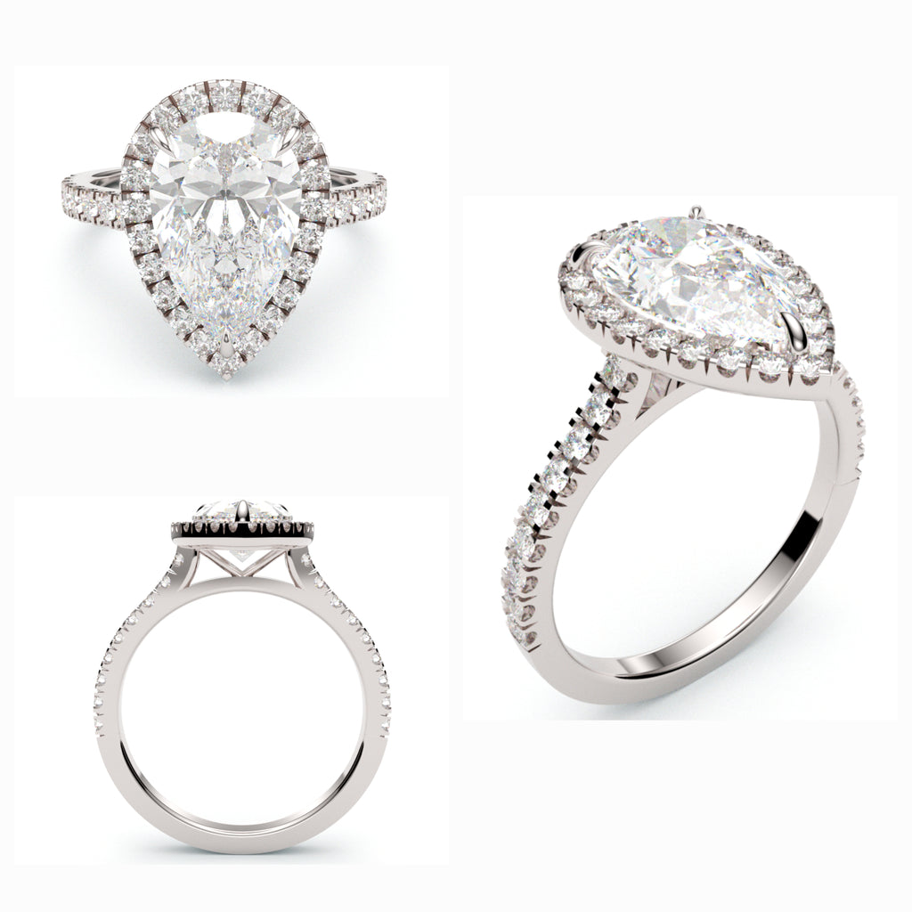 Vintage-inspired halo engagement ring with Pear-cut diamond surrounded by small accent diamonds