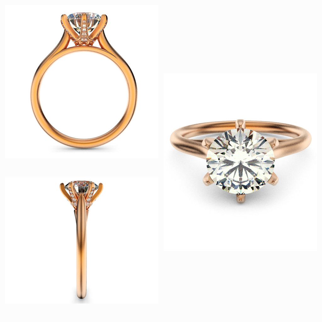 Minimalist engagement ring with Round-cut diamond in a sleek rose gold band